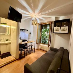 Studio moderne et chaleureux au coeur de Geneve - parfait pour courts sejours