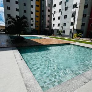 Apto c TV Streaming Ar Wifi e Piscina