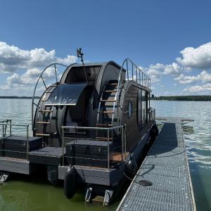 WOHLFÜHLBOOT Hausboot - Festlieger in der Marina Zaue am Schwielochsee - incl Stand Up Board
