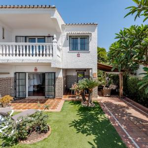 WintowinRentals Casa con jardín privado en primera línea de playa
