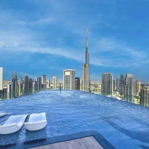 Restay Homes at Paramount Midtown Hotel - Highest infinity pool access with Burj View