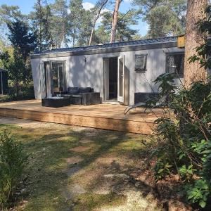 Sfeervolle woodlodge op 5 sterren vakantiepark