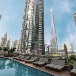 Restay Homes at Act Towers - Pool access with Burj View