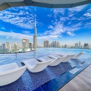 Spacious 2BR Paramount Midtown - Burj Khalifa View & Infinity Pool
