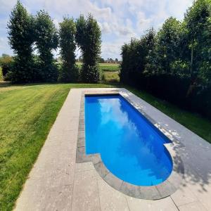 Rural holiday home with outdoor pool & sauna