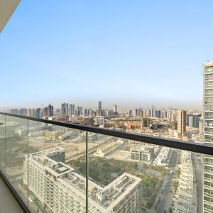 Stylish 2BR JVC with Pool, Gym Access, and City Skyline Views