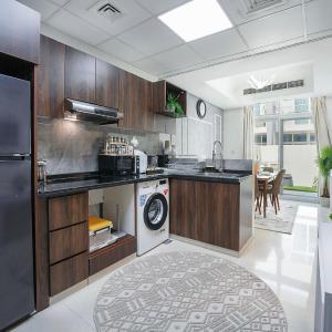 EasyGo Spacious 3BR with Garden in DAMAC Hills 2