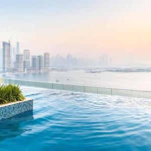 Seven Palm Studio - Direct Beach Access- Rooftop Infinity Pool