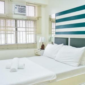 Modern Spacious 2BR Condo with Wifi at Aurora Gardens San Juan City near Rob Magnolia