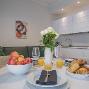 Bright & Chic 1BDR with shared rooftop terrace in San Babila