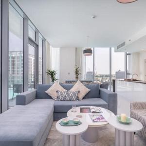 Vogue Vacation Homes, Al Maktoum City, District One Residence, within a short drive from Downtown Burj Khalifa and Dubai Mall, Three Bedroom Apartment plus Kids Room with Large Balcony