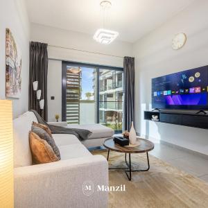 Relaxing JVC 1BR Apartment with Maid Room, Gym & Pool