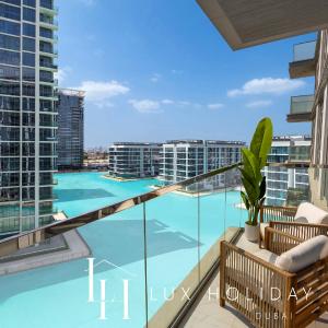 LUX 2BR Lagoon View District One, 10 to 15 min Burj Khalifa