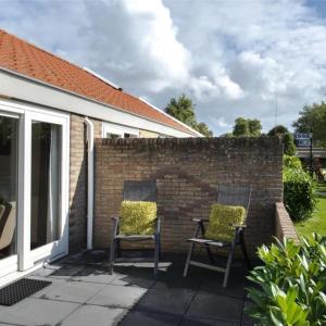 Holiday home in Nes with swimming pool