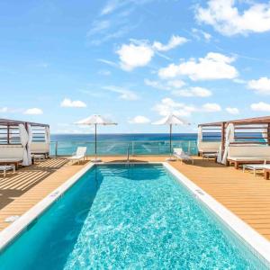 The Sands #1 - New 7Mile Beach Condo with Rooftop Pool & Luxe Interiors