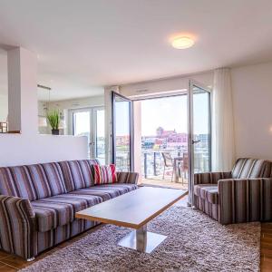 Sieglinde - Apartment in der Hafenresidenz mit Balkon & Wellness