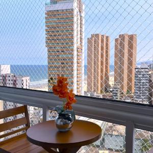 Apartamento Aconchegante e Elegante com Ar-Condicionado, Piscina, Garagem e Varanda Gourmet a 3 min da Praia