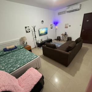 Room with toilet and tv for couple