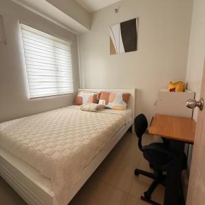Urban Oasis 2BR Condo with Multiple Pools at SMDC Charm Residences