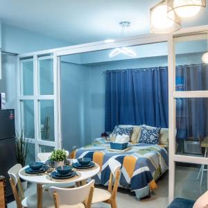 Elivion Staycations at McKinley Hill, near Venice, BGC, with Pool & Wifi