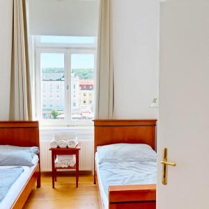 Suite Marie Antoinette, Blick auf den Stadtplatz, Traunseeblick - ideal für Paare und Kulturinteressierte