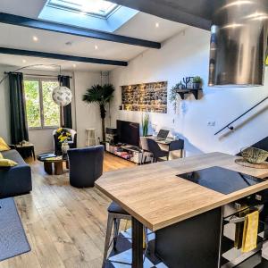 Duplex calme en centre-ville avec climatisation et parking gratuit