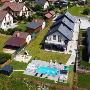 Apartmánové domy s bazénem Lipno 1