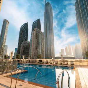 Vogue Vacation Homes, Downtown Forte near Dubai Mall and Burj Khalifa, Two-Bedroom Apartment with Balcony and City View, full access to all amenities