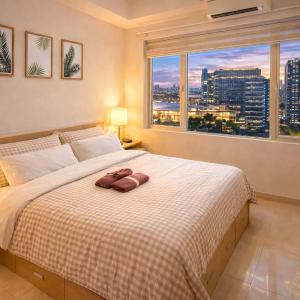 907 Air Condo 1BR Shell Residences 2 Min to MOA
