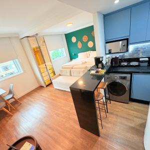 Lindo flat com garagem no Hotel Quality Oscar Freire