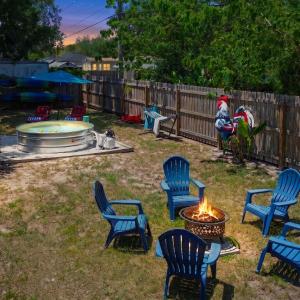Spacious 4 bedroom 3 bath Clearwater Vacation House Cowboy Pool Fire Pit Games Close to Clearwater Beach Biking Trail Farmers Markets Harbor Health Spa Baycare Ballpark and Ruth Eckerd Hall Golf Courses