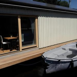 B&Boathouse Amsterdam with bikes and motorboat