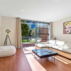 Sleek Modern Pad next to Spark Arena Zodiak Stays