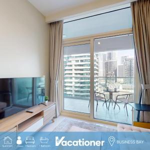 Vacationer Holiday Homes I Cosy 1 Bedroom l Private Balcony with City Views l Business Bay