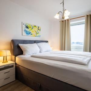 Exklusive Ferienwohnung am Südstrand mit Meerblick & Balkon Wohnung 10