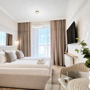 Roosevelta Residence APARTHOTEL by Properbook - przy OFF Piotrkowska - Faktura Vat - Klimatyzacja - WI-FI - Śniadania - Atlas Arena, - Orientarium - Aquapark Fala - EC1