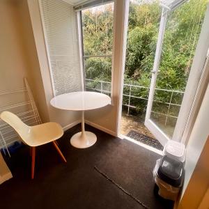 Studio is 2nd door past carport