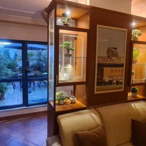 The Bloom Veranda - Elegant City Center Retreat