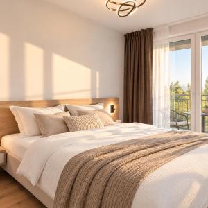 ALURE RESIDENCES 9 & 24h self check-in, private parking in front of the apartment building included, new building, terrace, the apartment building has its own park with a lake and outdoor fitness, children's playground, CITY CENTER