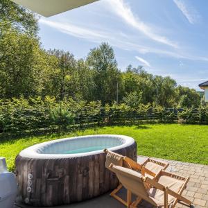 Apartament Słoneczna Sosnówka z sezonowym jacuzzi