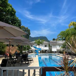 Villa Marae - Casa com AC, churrasqueira e piscina em condomínio!