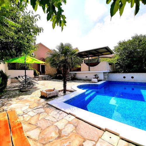 Family friendly house with a swimming pool Brela, Makarska - 6685