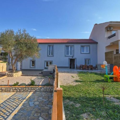 Family friendly house with a parking space Kolan, Pag - 18621