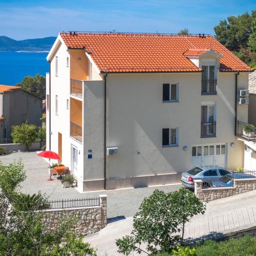 Apartments and rooms by the sea Brela, Makarska - 13118