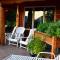 Foto: The Rockwell-Harrison Guest Lodge 100/104