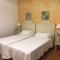 Apartamentos Turísticos - Hostal Los Alisos
