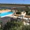 Villa Ceni - Appartamenti con camere, cucina, wc e terrazza sul mare in villa con piscina, giardino e parcheggio