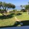 Seafront Calista Beach House With Garden