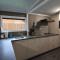 Modern chalet in a small park with a fishing pond