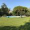 Mansarda Residence L’Oliveto in un parco di 9000 mq con piscina